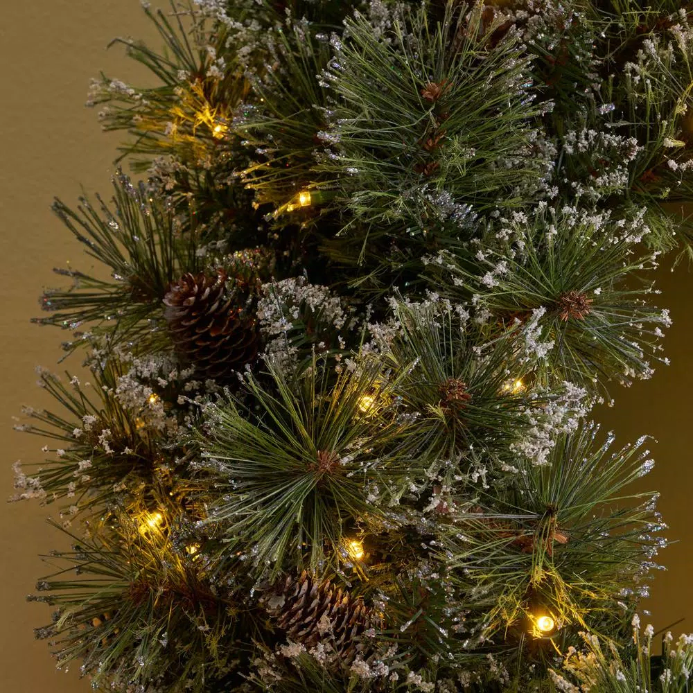 Noble House 24 in. Pre-Lit LED Artificial Christmas Wreath with Flocked Snow, Glitter, and Pinecones