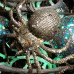 National Tree Company 23 in. Potted Halloween Tree with Sequined Leaves and Spiders thumbnail 3