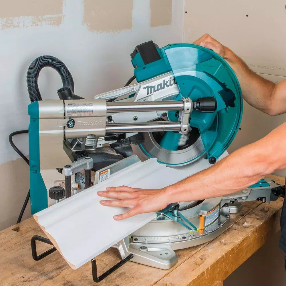 Makita 12 in. Dual-Bevel Sliding Compound Miter Saw with Laser and WST06 Folding Stand Bundle