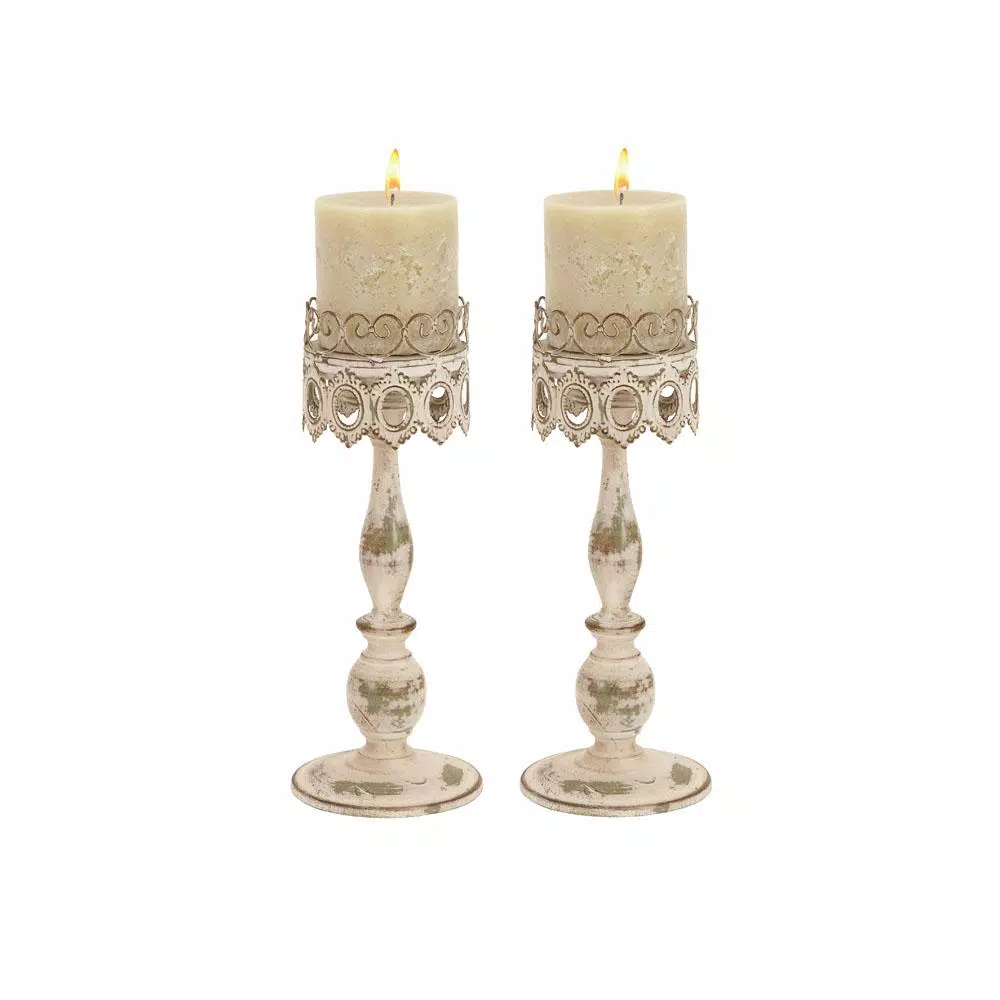 LITTON LANE 14 in. Distressed Ivory Iron Pillar Candle Holders with Filigree Design (Set of 2)