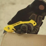 Klein Tools 0.75 in. Self-Retracting Utility Knife with Safety Yellow Handle and Rubberized Grip thumbnail 2
