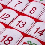 Glitzhome 36 in. Oversized 3D Santa Countdown Christmas Stocking with Plaid Cuff thumbnail 2