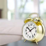 Equity by La Crosse Analog 4.5 in. Gold Metal Twin Bell Keywind Alarm Clock thumbnail 5