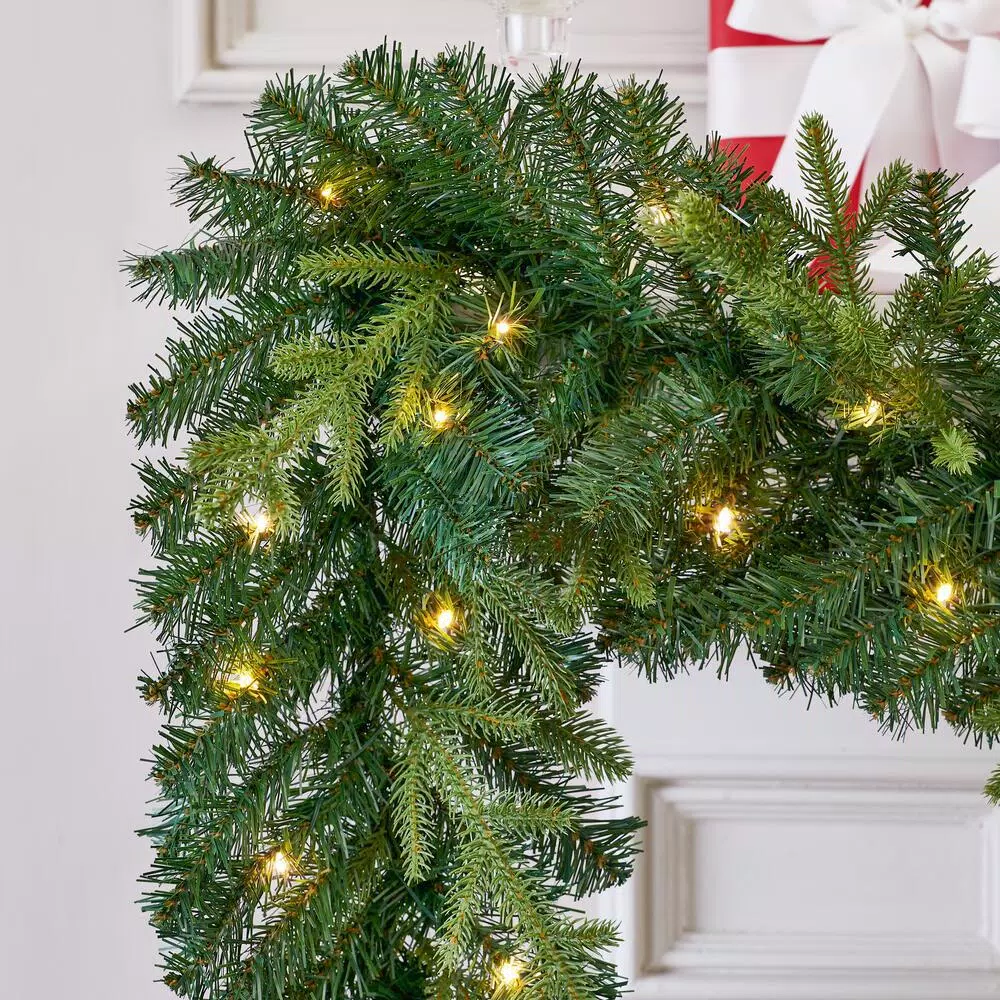 Home Accents Holiday 12 ft. Noble Fir Pre-Lit LED Christmas Garland with Timer, Warm White Micro Dot Lights