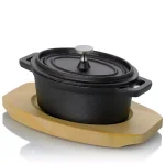 Gibson Home Campton 0.35 qt. Oval Cast Iron Mini Casserole Dish with Lid and Wood Base, Black thumbnail 1