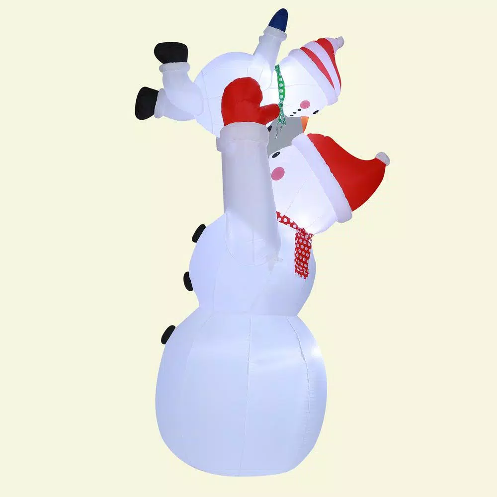 Luxen Home 8 ft. Snowman Family Playing Inflatable Holiday Yard Decor with LED Lights