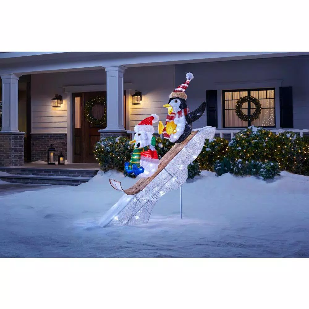 Home Accents Holiday 4 ft LED Penguin and Skating Snowman Yard Decoration