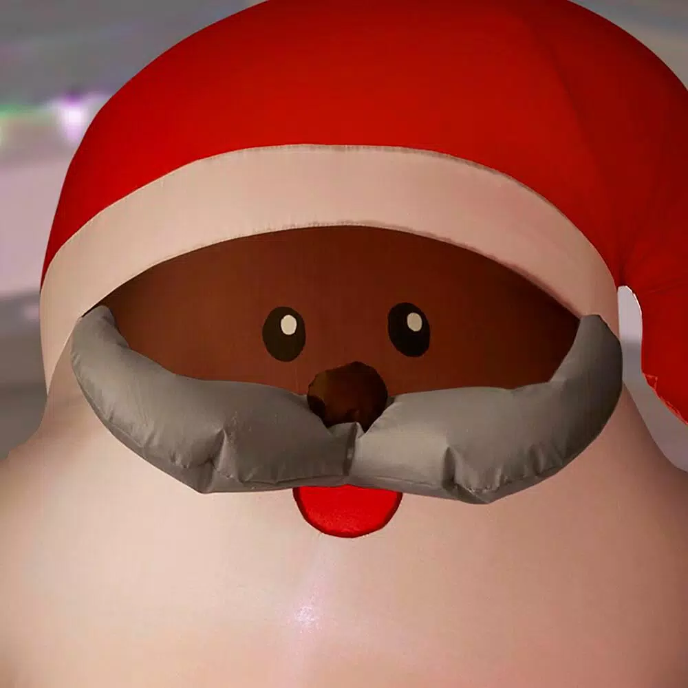 Home Accents Holiday Gemmy Airblown 6.5 ft. LED Outdoor Inflatable African-American Santa with Present
