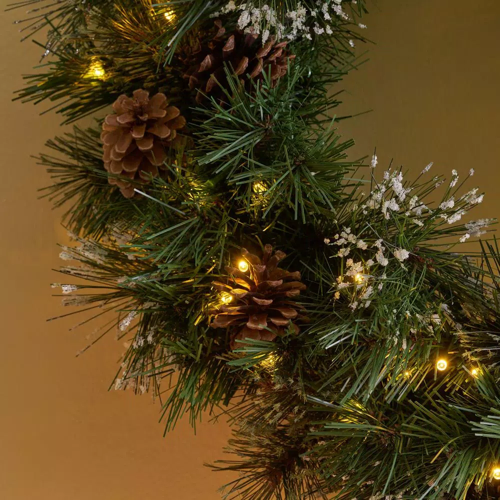 Noble House 24 in. Pre-Lit LED Artificial Christmas Wreath with Snowy Branches and Pinecones, Warm White