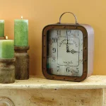 Stonebriar Collection Grand Central Station 14 in. x 10 in. Rustic Metal and Glass Square Tabletop Analog Clock thumbnail 1