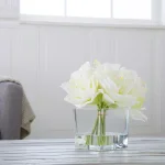 Pure Garden 8.5 in. Cream Lily Floral Arrangement in Square Glass Vase thumbnail 8