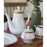 Noritake Charlotta Gold White Porcelain 49 oz. Coffee Server with Lid thumbnail 2