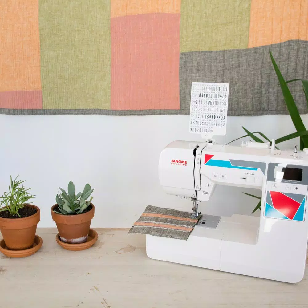 Janome MOD-100Q Computerized Quilting and Sewing Machine with Bonus Accessories