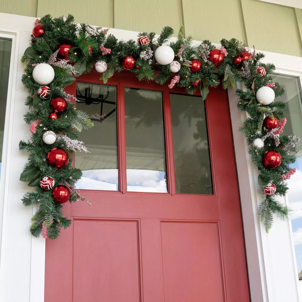 Village Lighting Company 9 ft. Pre-Lit LED Nordic Red and White Christmas Garland with 100 Mini Lights