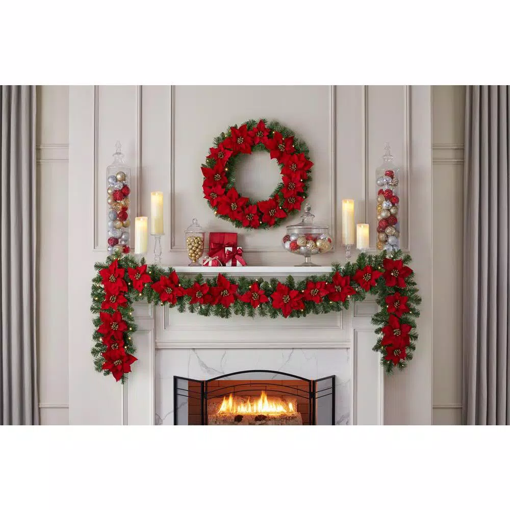 Home Accents Holiday 9 ft. Berry Bliss Pre-Lit LED Artificial Christmas Garland with Red Poinsettias