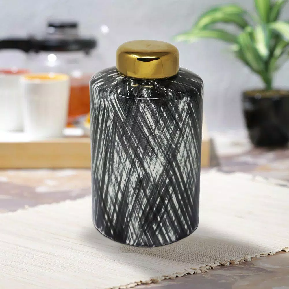 Benjara Black and White Ceramic Lidded Ginger Jar with Criss Cross Pattern and Gold Lid