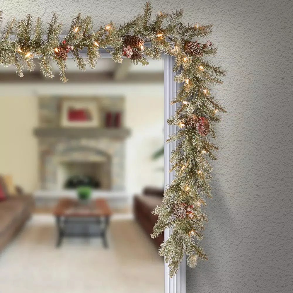 Unbranded 9 ft. Dunhill Fir Artificial Garland with 50 Clear Lights, Red Berries, and Pine Cones