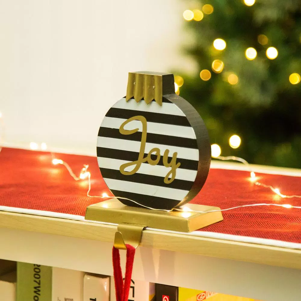 Glitzhome 6.89 in. Striped Wooden and Metal Stocking Holder with Joy Design