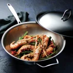 Tramontina 12 in. Tri-Ply Clad Stainless Steel Wok with Lid thumbnail 6
