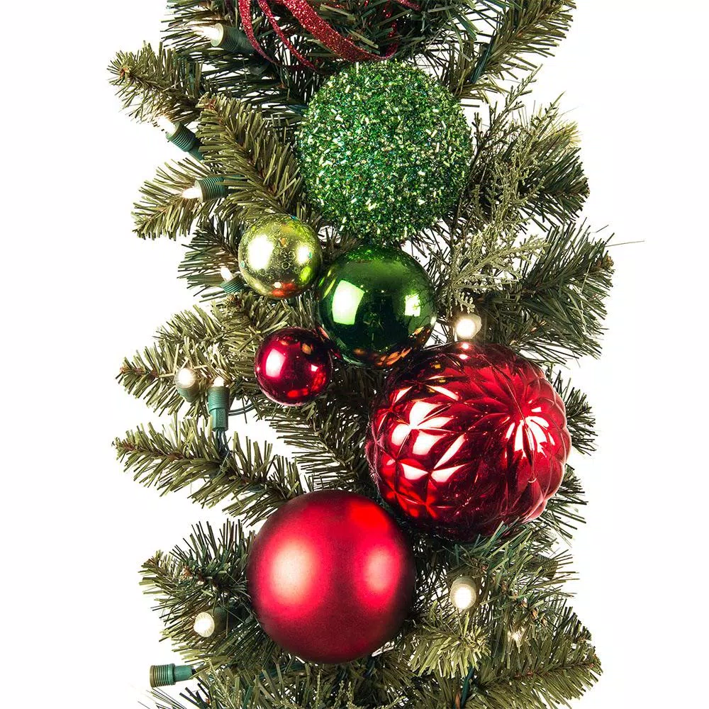 Village Lighting Company 9 ft. Pre-Lit LED Festive Holiday Pine Garland with Red and Green Ornaments