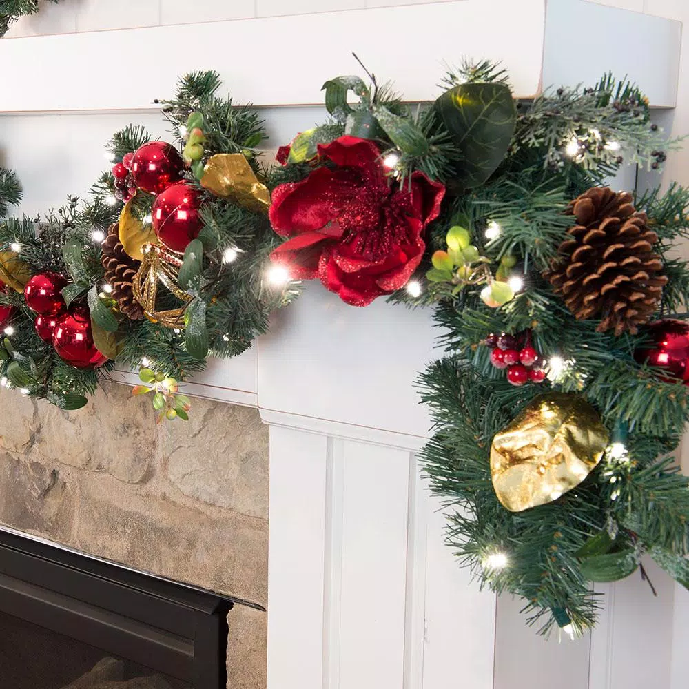 Village Lighting Company 9 ft. Pre-Lit Red Magnolia Christmas Garland with 100 LED Mini Lights