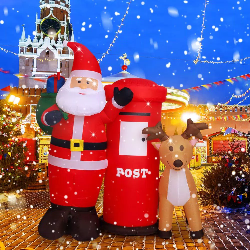 JOYDECOR 6 ft. Santa Claus with Postbox and Reindeer Christmas Inflatable with LED Lights