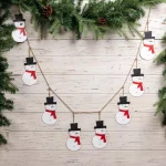 Glitzhome 6 ft. Metal Snowman Christmas Garland, Rustic Holiday Decor thumbnail 4