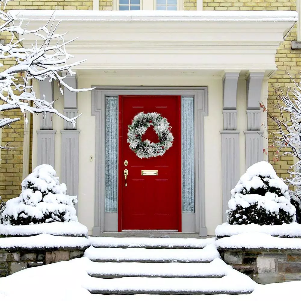 Fraser Hill Farm 24 in. Artificial Christmas Wreath with Snow Flocking, Pinecones, and Red Berries