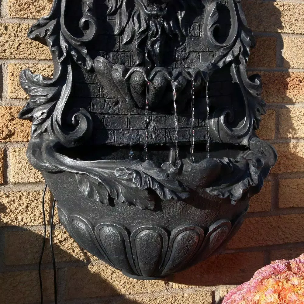 Sunnydaze Decor 30 in. Stoic Courage Lion Head Solar Wall Fountain with Battery Backup