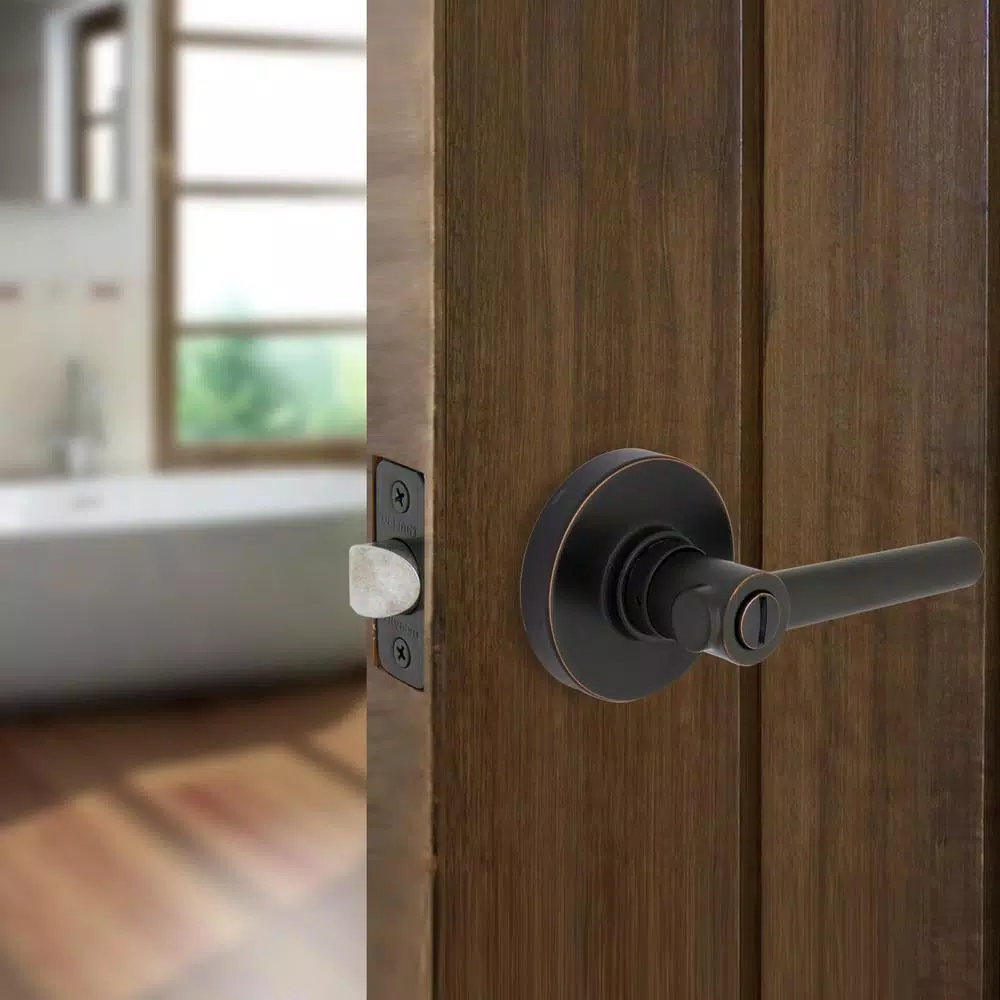 Defiant Highland Aged Bronze Privacy Door Lever with Round Rose