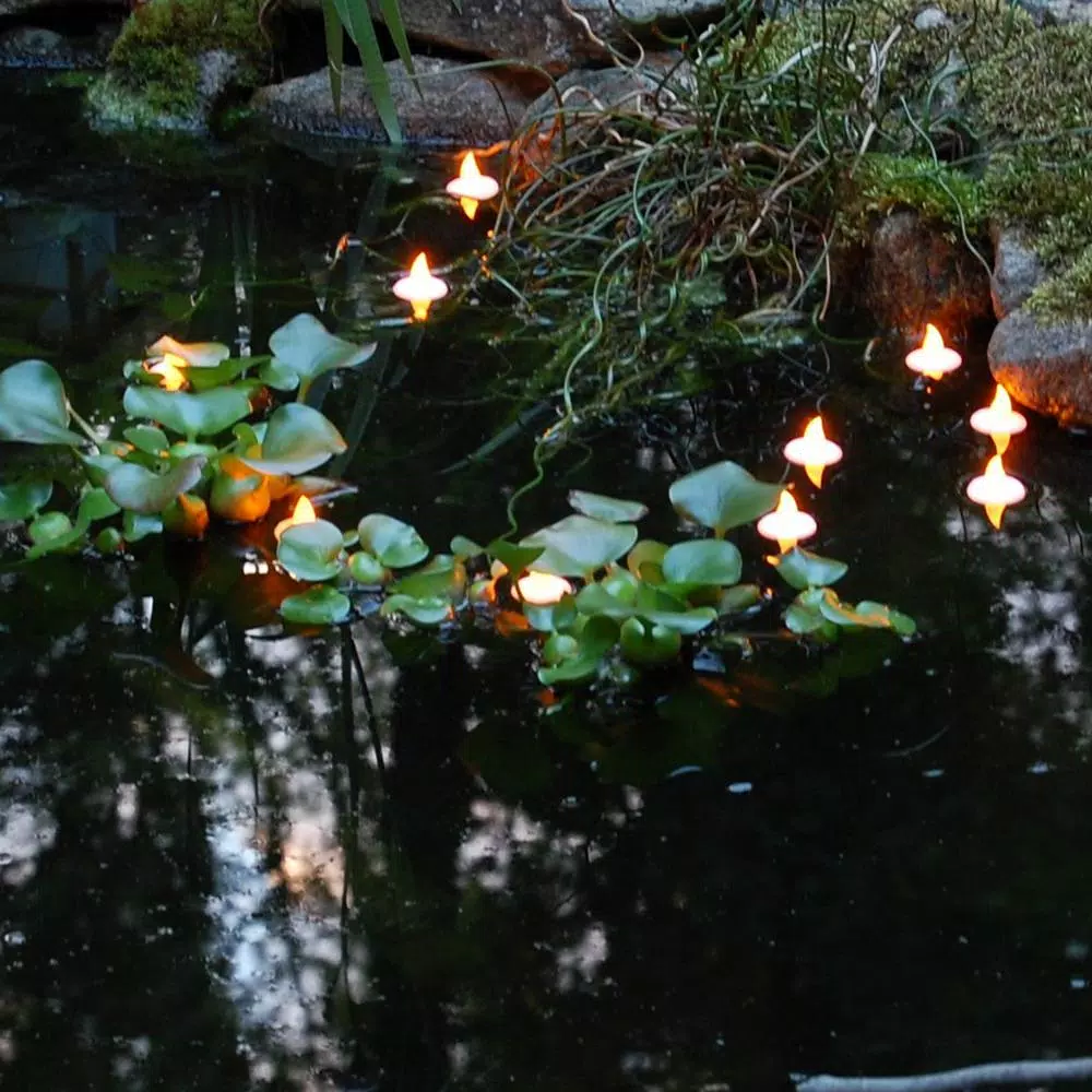 LUMABASE Amber Floating LED Tea Light Candles, Waterproof Battery Operated, 1.25 x 1.25 in, 12-Count