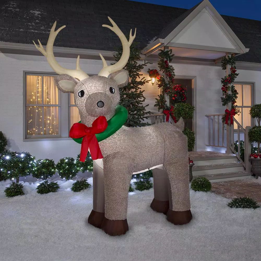 Home Accents Holiday 11 ft. Pre-Lit Giant Airblown Inflatable Fuzzy Reindeer with LED Lights
