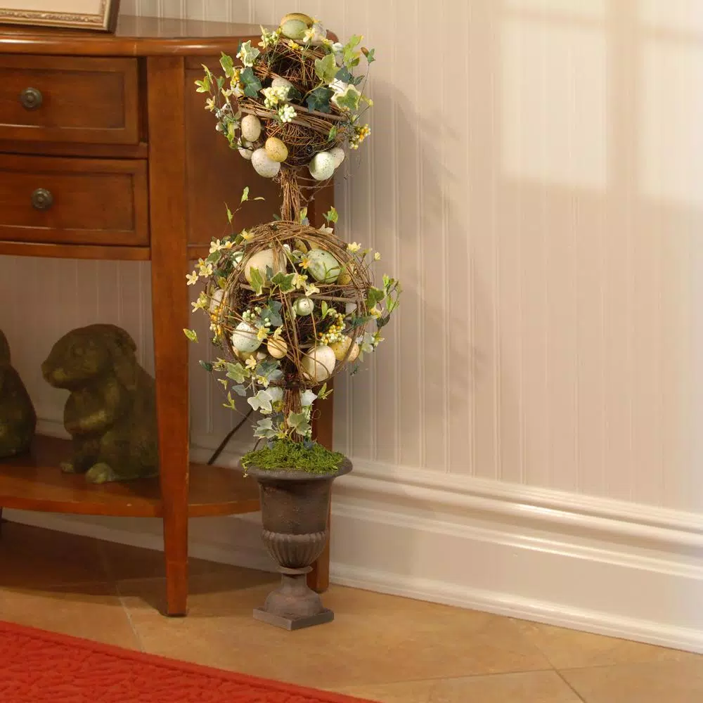 National Tree Company 33 in. Topiary Easter Tree with Woven Wood Vines, Flowers, and Pastel Eggs in Decorative Urn