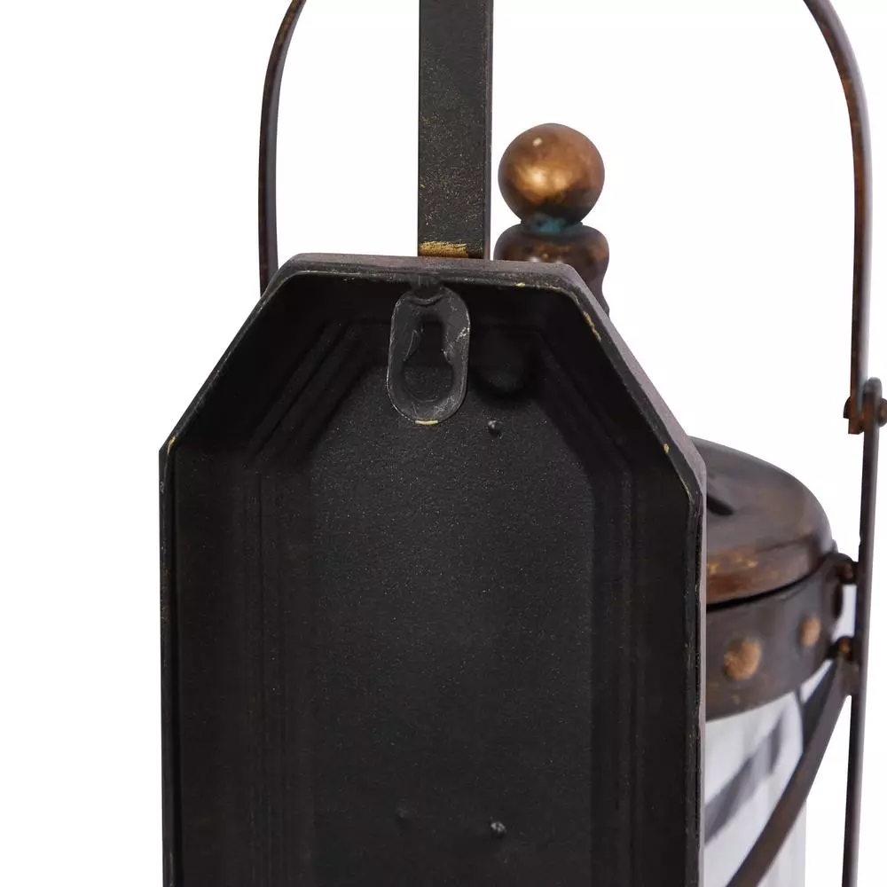LITTON LANE Old World Riveted Burnished Bronze Iron Candle Sconce with Fleur-de-lis Motif