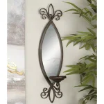 LITTON LANE 25 in. New Traditional Wall Candle Sconce with Elliptical Mirror and Textured Bronze Finish thumbnail 1