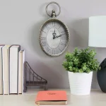 Stratton Home Decor Antique Silver Oval Wall Clock with Roman Numerals thumbnail 3