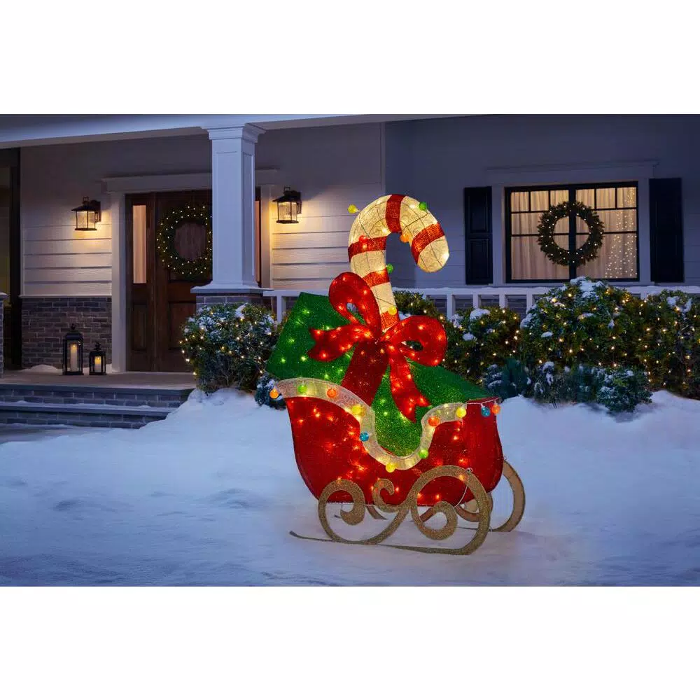 Home Accents Holiday 61 in. LED Sleigh with Presents Yard Decoration, Cool White Lights