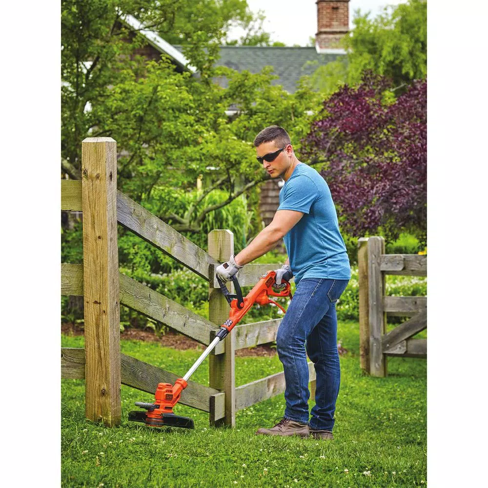 BLACK+DECKER 14 in. 6.5 Amp Corded Electric String Trimmer and Edger with EASYFEED