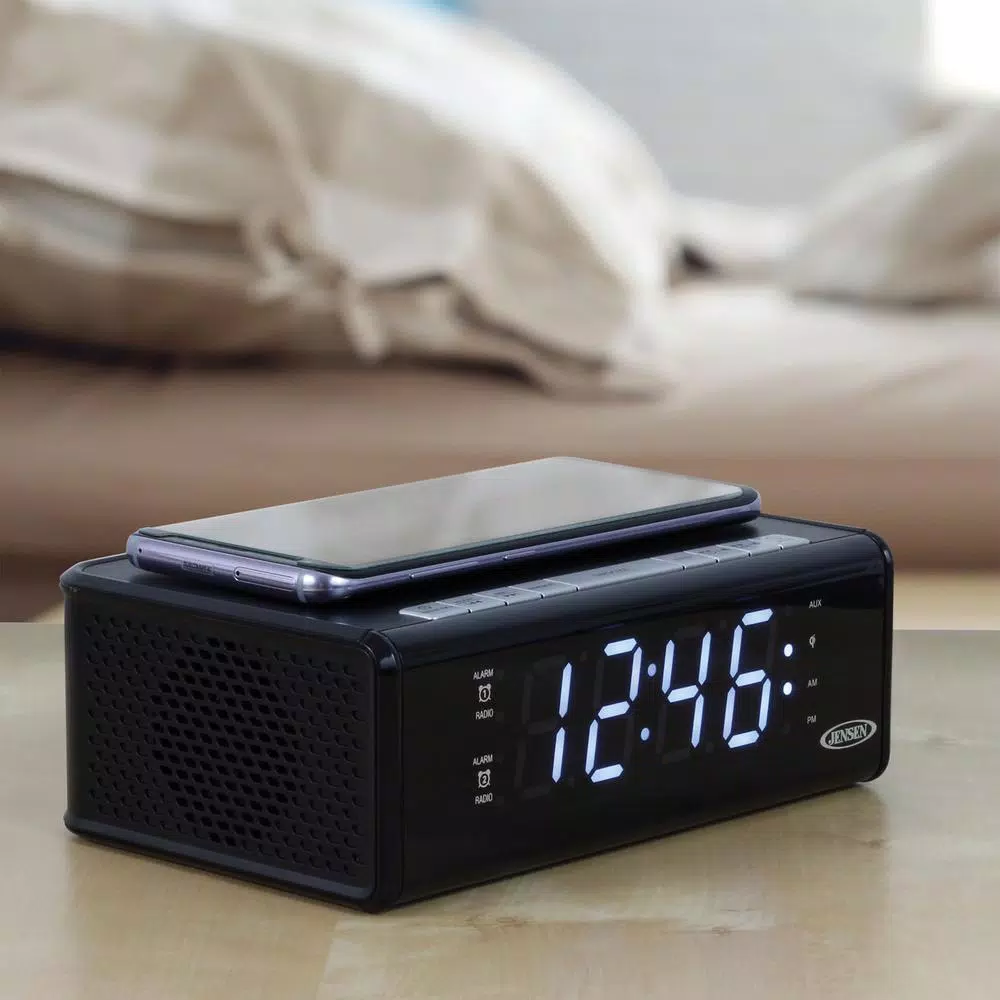 JENSEN Dual Alarm Clock Radio with Qi Wireless Charging, AM/FM, USB Port, and Aux Input - Black