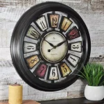 FirsTime & Co. FirsTime 22.5 in. Round Numeral Plaques Wall Clock, Multicolor Modern Quartz Analog thumbnail 1