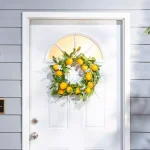 Gerson International 24 in. Lemon Wreath with Yellow Berries and White Blossoms thumbnail 3