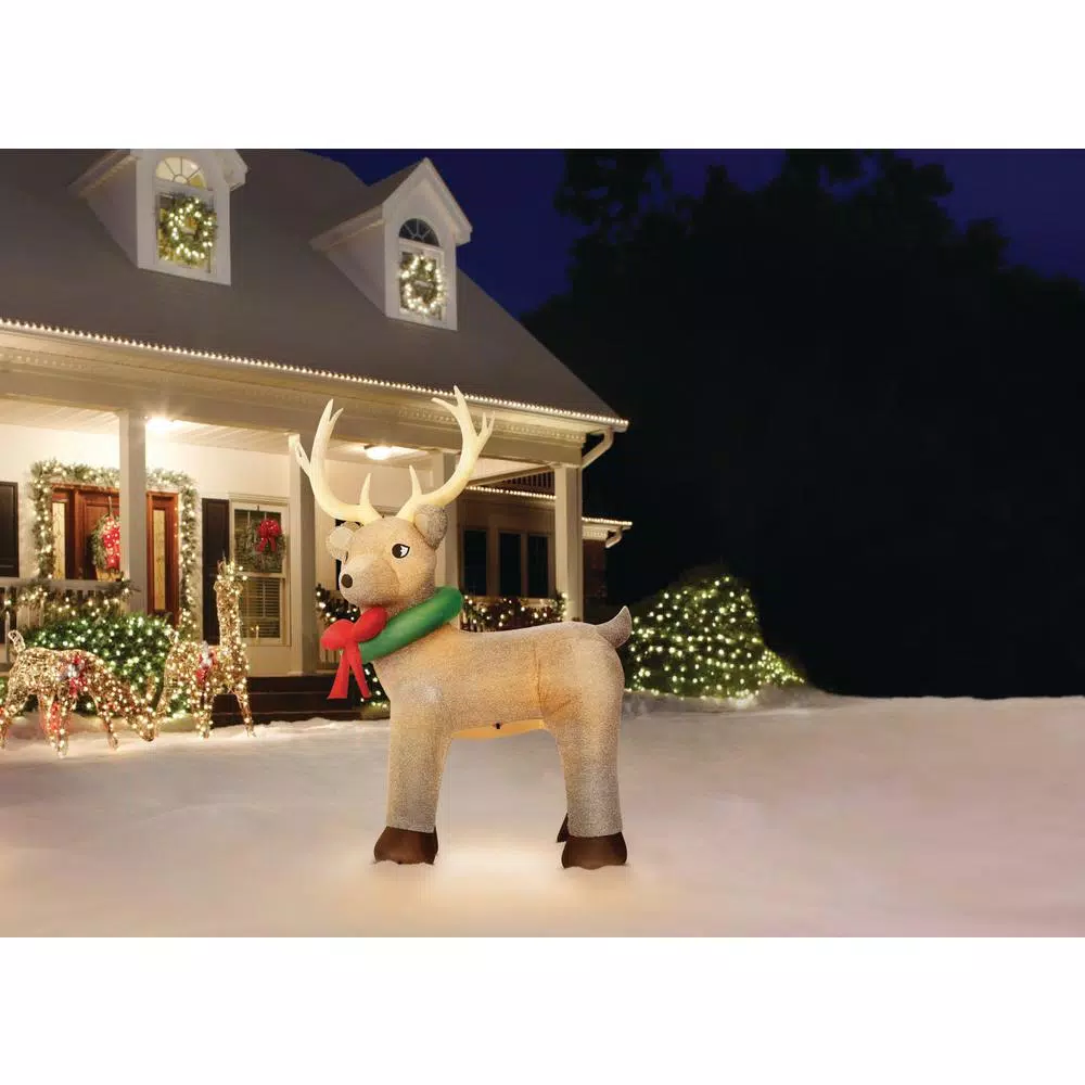 Home Accents Holiday 11 ft. Pre-Lit Giant Airblown Inflatable Fuzzy Reindeer with LED Lights