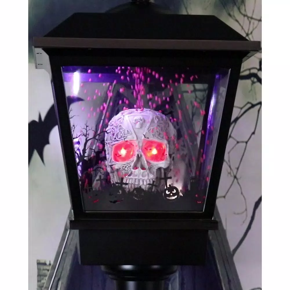 Haunted Hill Farm 71 in. Black Animated Skull Lamp Post with Spooky Music