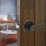 Defiant Highland Aged Bronze Passage Door Lever with Round Rose thumbnail 2