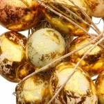 Unbranded 12 in. Gold and Pearl Egg Wreath with Woven Branch and Vine Accents thumbnail 2