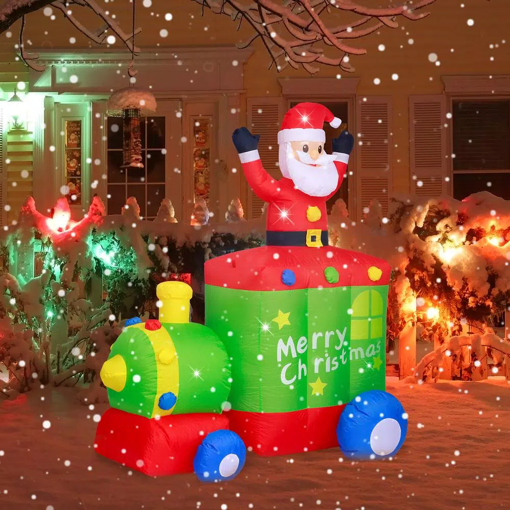 JOYDECOR 6 ft. Santa Claus on Train Christmas Inflatable with Built-in LED Lights