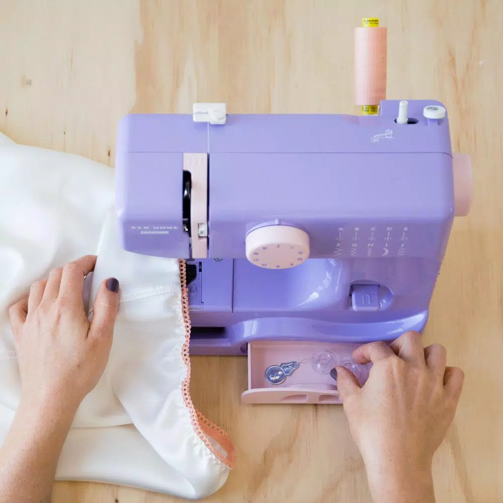 Janome Lady Compact Sewing Machine - 10 Stitch Options, 5 lbs Portable Design