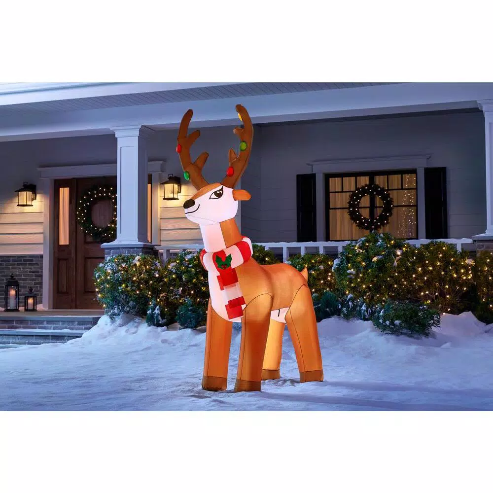 Home Accents Holiday 6 ft. Airblown Inflatable Reindeer with LED Lights and Striped Scarf