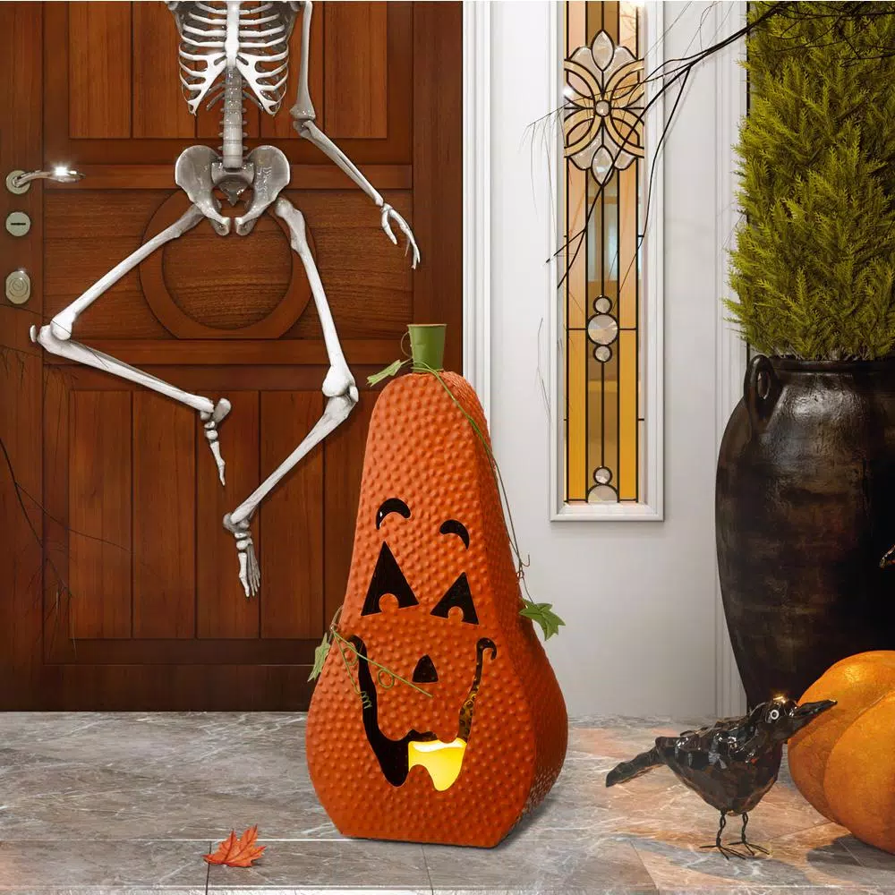 Glitzhome 23.62 in. Metal Jack-O-Lantern Halloween Decor with LED Pillar Candle