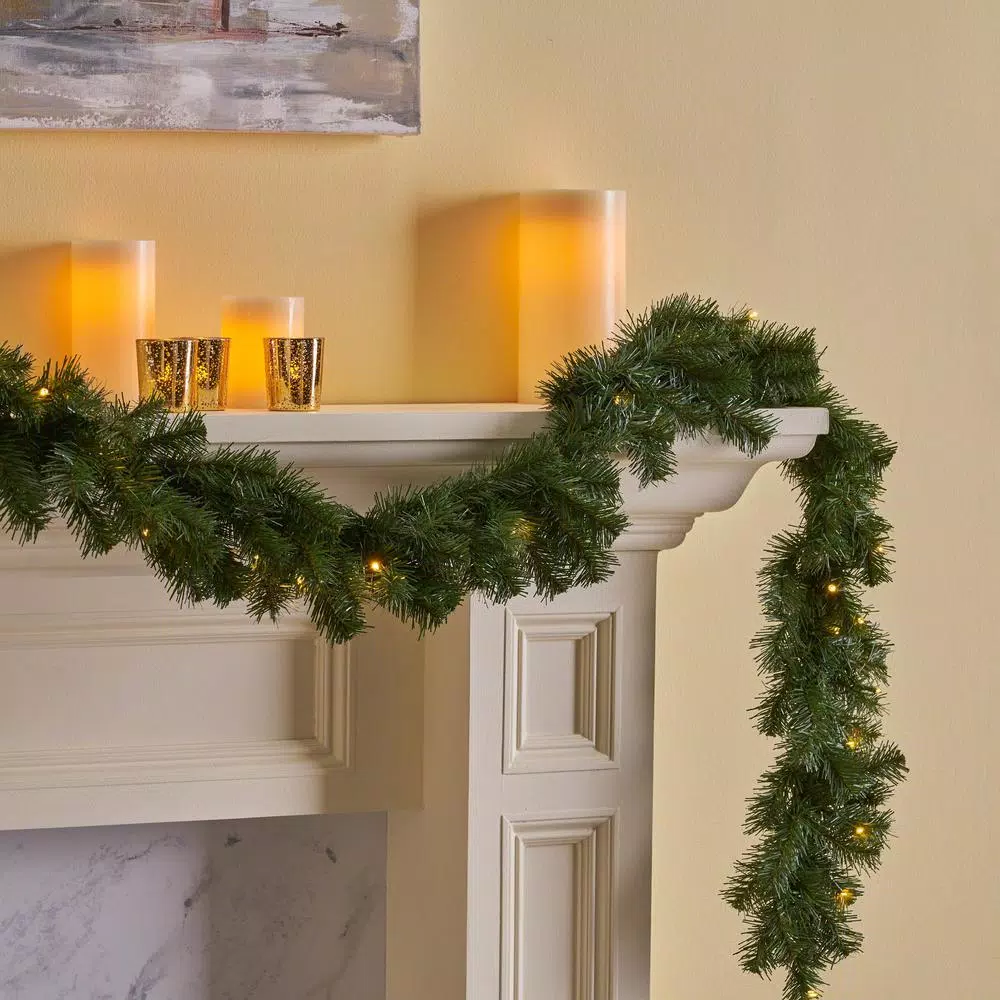 Noble House 9 ft. Noble Fir Pre-Lit Artificial Christmas Garland with 50 Warm White LED Lights and Timer